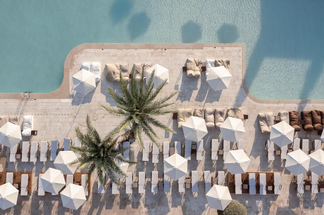 Helea Lifestyle Beach Resort Kallithéa المظهر الخارجي الصورة Aerial view of the pool at the Westin Dubai